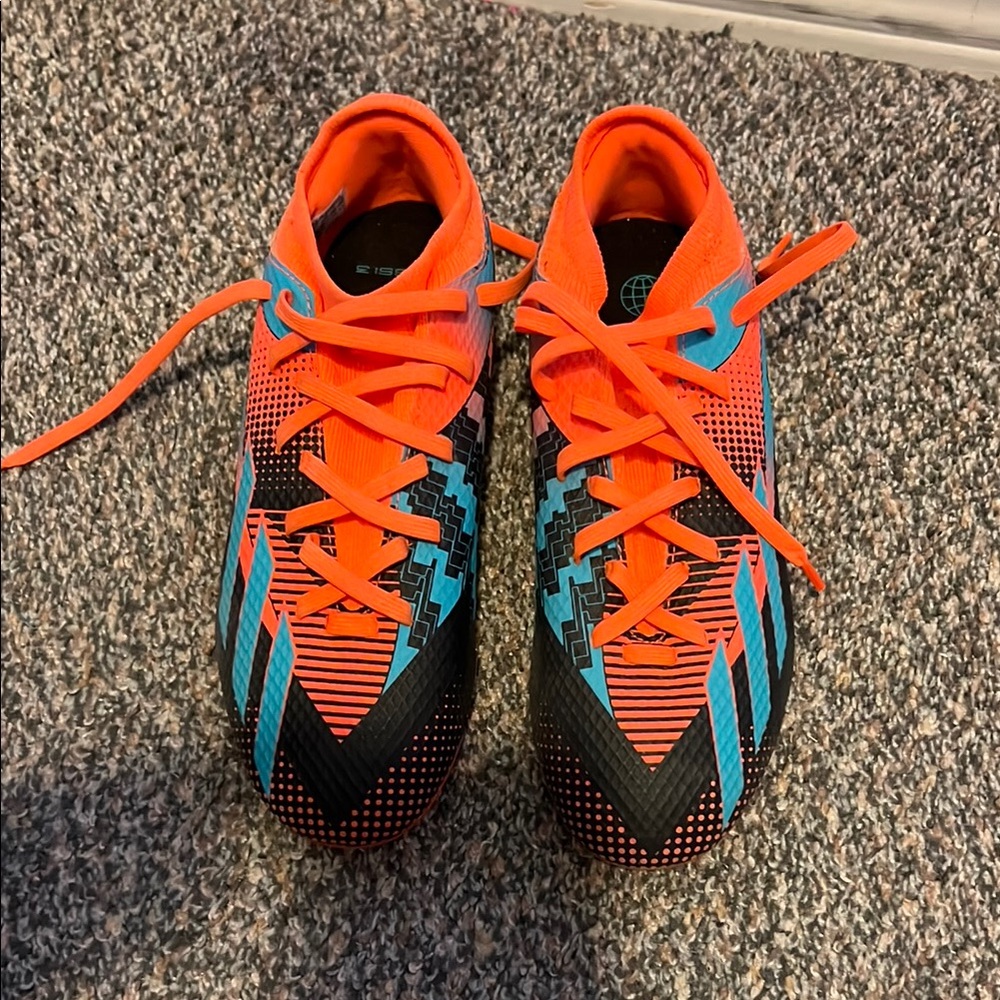 Messi Adidas. Vibrant Orange and Blue Kids soccer  Shoes Messi Cleats size 5.